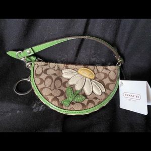 Brand new, with tags Coach change purse.